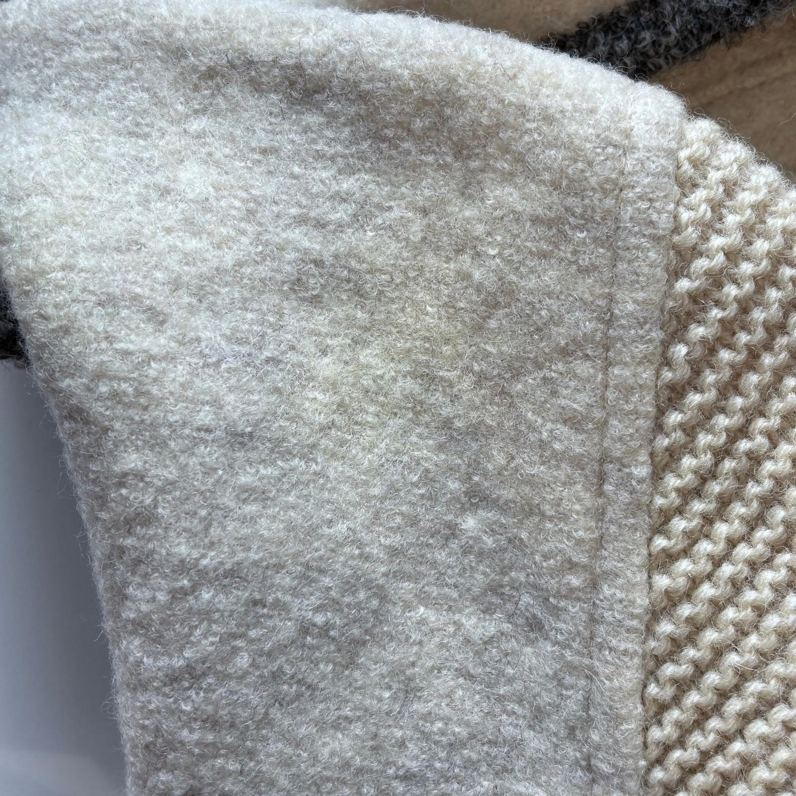 Close-up of textured fabric with a slight mark.