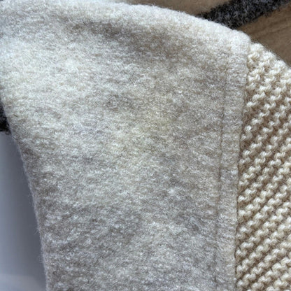 Close-up of textured fabric with a slight mark.